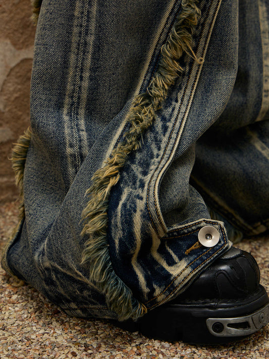 Fluid-structured Spliced Raw-edge Jeans